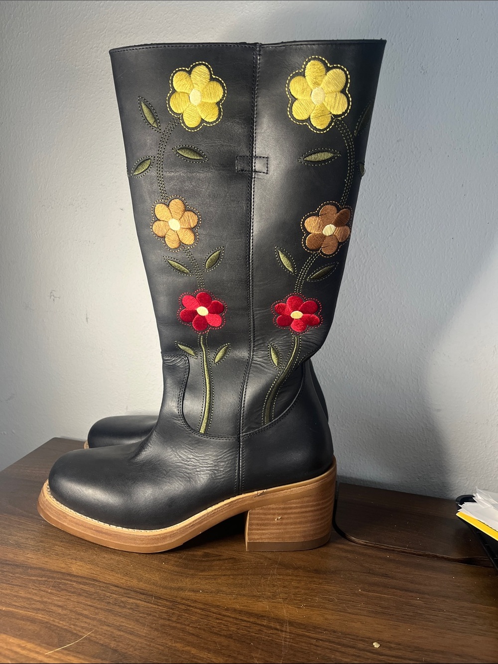 Black Leather Knee-High Boots with Floral Appliqué